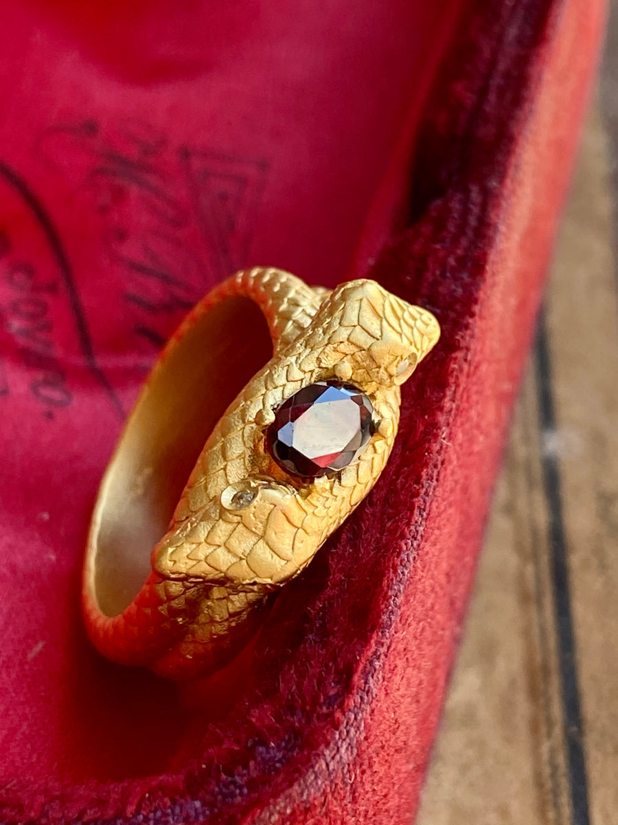 Coiled Snake Ring with Garnet - ShopSacredBarcelona